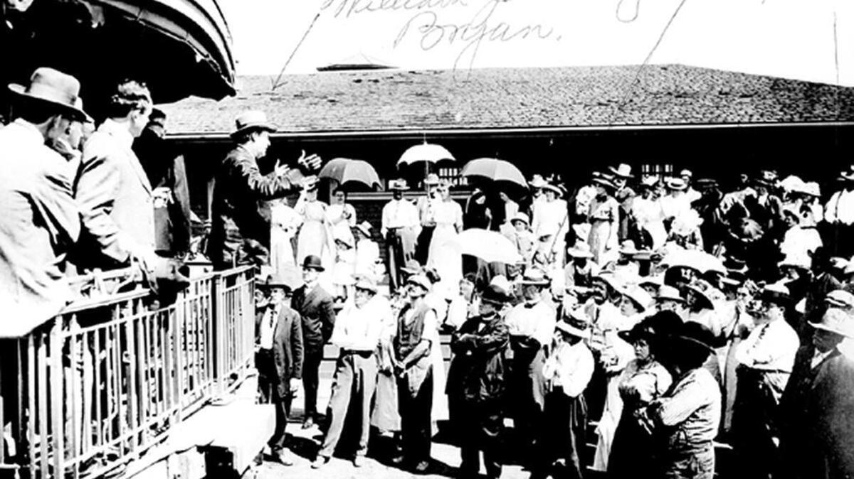 William Jennings Bryan speaks from the back of a Santa Fe Railroad car at the Planada depot in 1912. This photo and information was contributed by Reta Reiman Tesone, whose father Milt Reiman is identified in center of the photo.