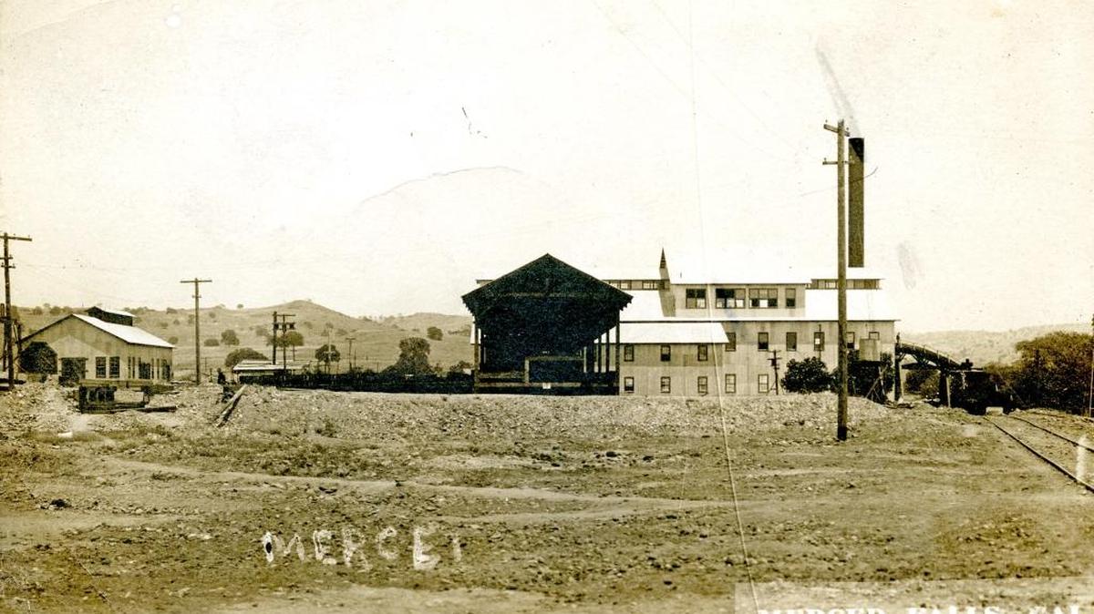 Hugo Barrett’s postcard to his wife Emma Alice was postmarked Feb. 3, 1913. The postcard image depicts the Yosemite Lumber Company mill at Merced Falls. (Grey Roberts Collection)