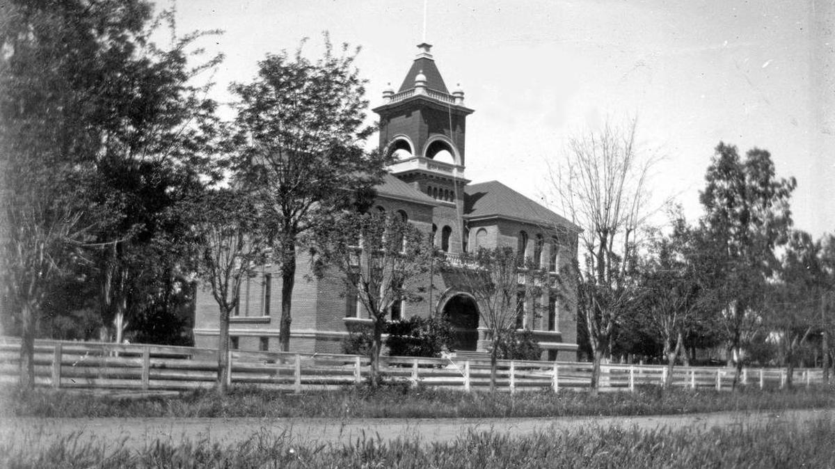 Merced Union High School was the first high school in Merced County located on M Street, between 21st and 22nd Streets. The building in the Richardsonian Romanesque style was built in 1897 and served as a high school until 1920. (Courthouse Museum Collection)