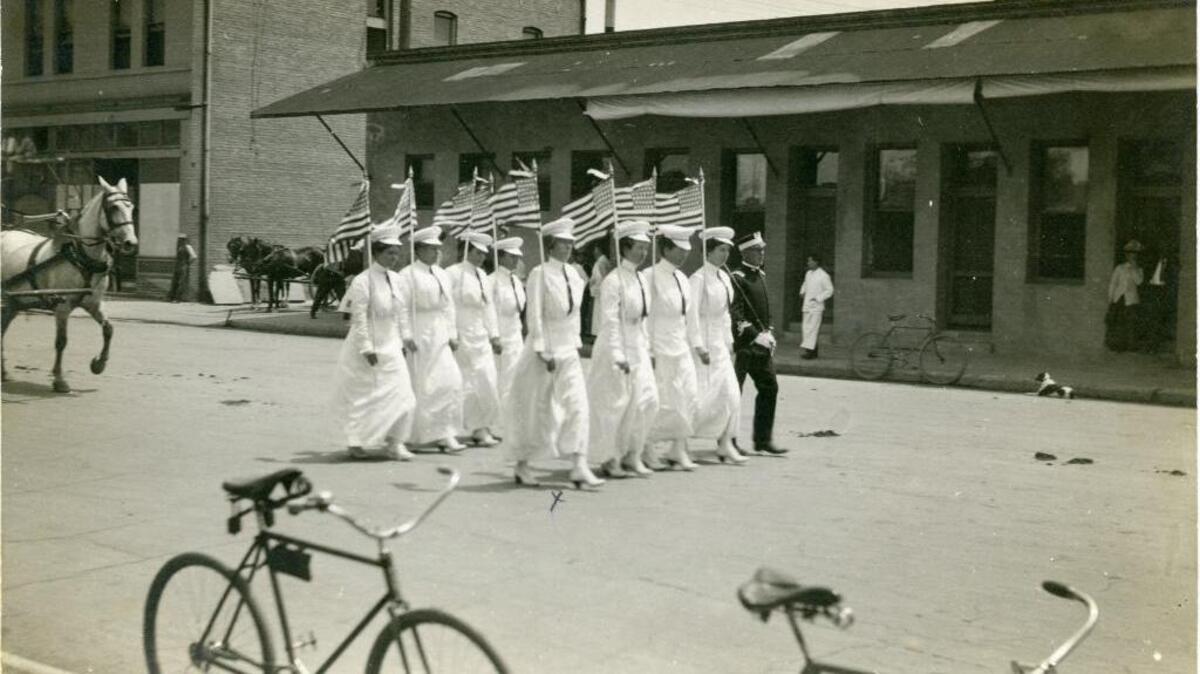 Grey Roberts’ postcard of The Fraternal Brotherhood Ladies’ Drill Team in the Society Circus Parade on May 22, 1912. Notice Captain Paul Thon is in uniform. This uniform did not arrive in time for his drill team’s competition during T.F.B. annual convention on April 26, 1912.
