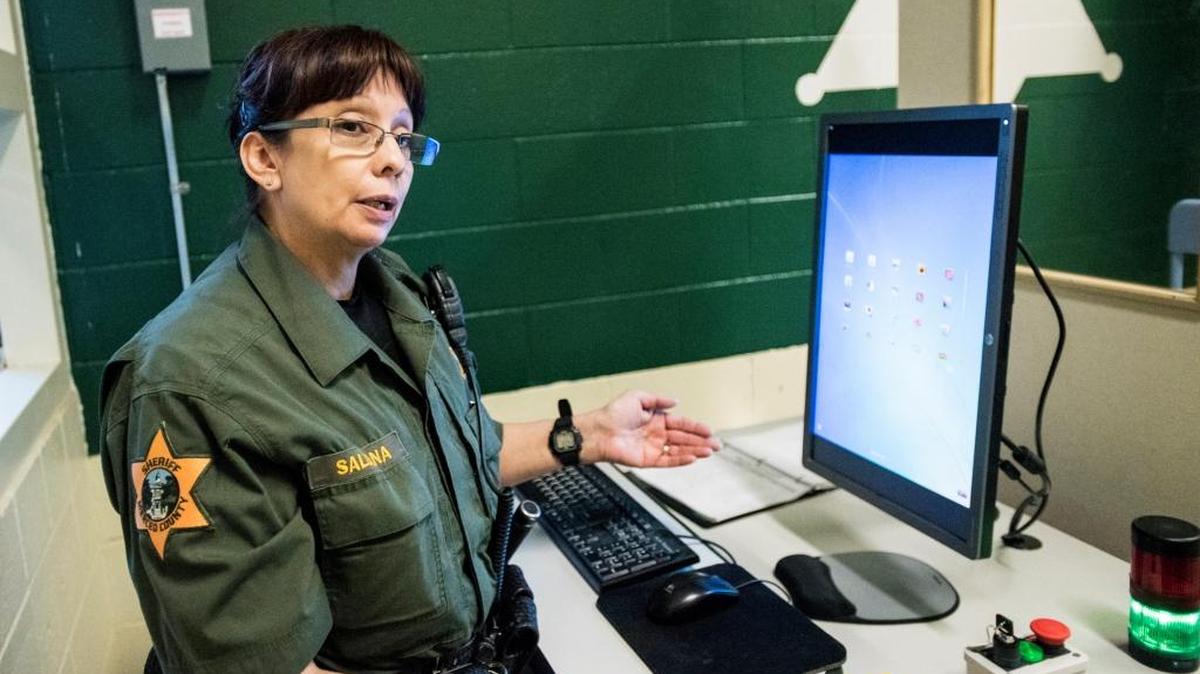 Officer Saldana explains the body scan process at the Merced County Sheriff's Department Jail in Merced, Calif., Thursday, Feb. 18, 2016. According to Merced County Sheriff Capt. and Commander of Jail Operations, Greg Sullivan, the body scanner was installed last summer and has been in use since October 2015.