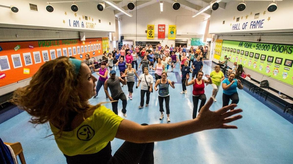 
Merced resident Viridiana Cardenas leads a Zumba class at Crookham Elementary School in Winton on Thursday. The school opened its doors for the first time Thursday evening allowing families a place to exercise free of charge. The fitness program is a result of a partnership between the Merced County Department of Public Health, Dignity Health, Cultiva La Salud and the Winton School District.
