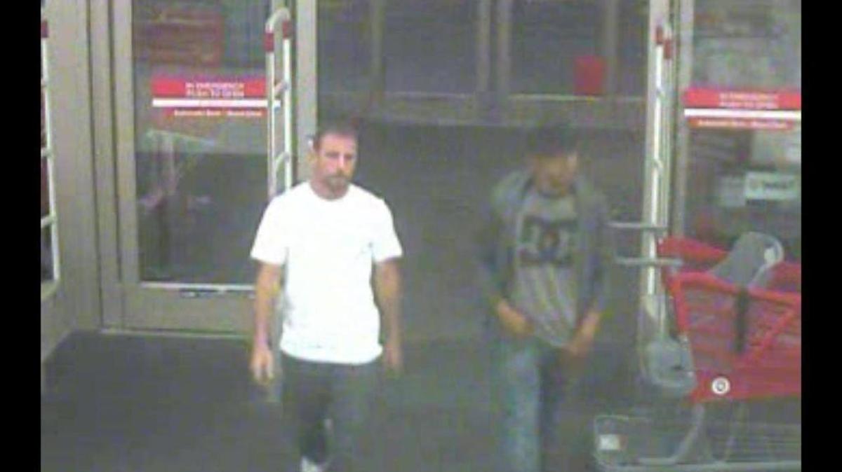 Target surveillance footage shows a man entering the store who is later seen stealing televisions by going through an emergency exit.