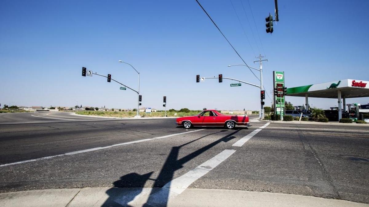 A motorist drives through the intersection of Hammatt and Walnut avenues in Livingston, Calif., on Friday, Aug. 5, 2016. Livingston resident Bagicha Singh was struck and killed by a vehicle as he was walking east across Hammatt Avenue on Dec. 9, 2015. His family has filed a claim of liability against the city of Livingston, claiming a streetlight was not working at the time of the incident.