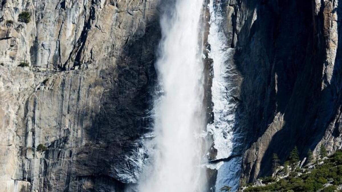 Water flows over Upper Yosemite Fall at Yosemite National Park on Wednesday, March 23, 2016.