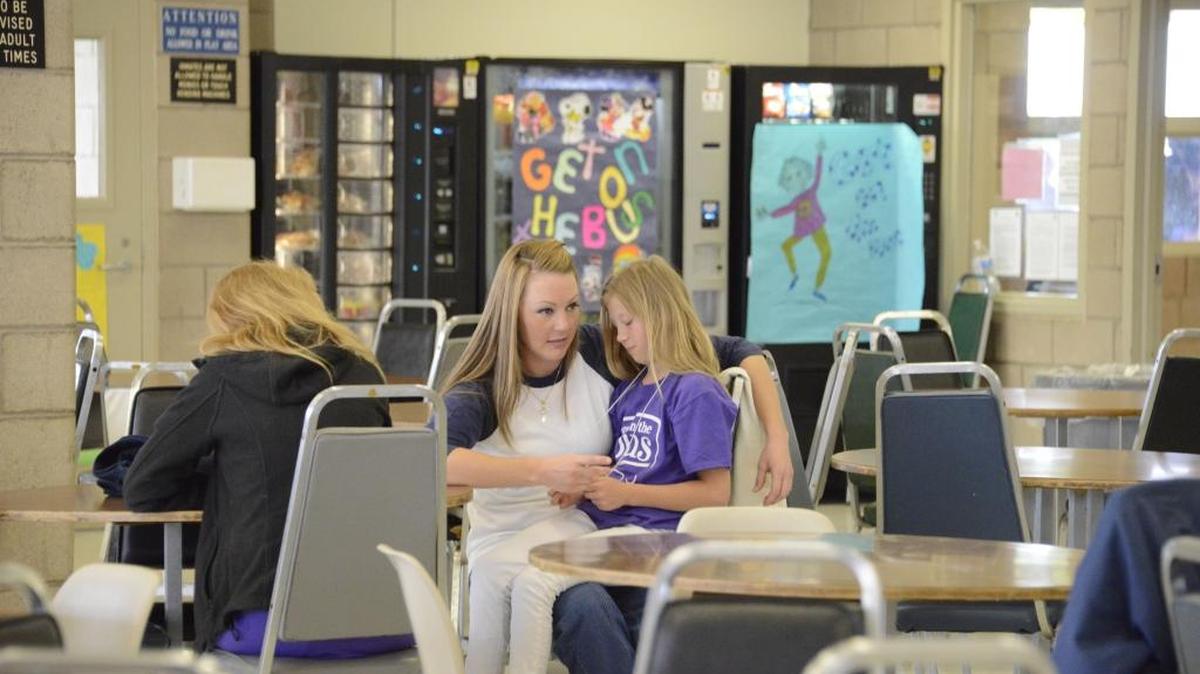 Amy Butler, 29, of Marysville shares a conversation with her daughter, Constance Griffin, 9, at the Central California Women’s Facility on Friday, May 6, 2016.