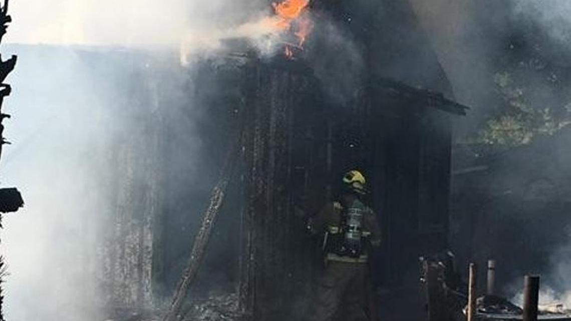 Dos Palos and Merced County Calfire firefighters battle a blaze that destroyed a vacant Dos Palos home Saturday, July 15, 2017, in the 1200 block of Norton Avenue.