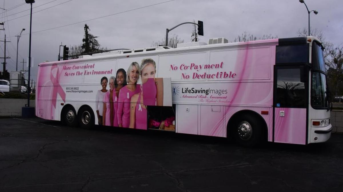 One of the mobile clinics for Life Saving Images, an organization focused on providing mammography scans for women, is set up at Bear Creek Galleria on Thursday. Screening are done inside the bus and no woman is turned away.