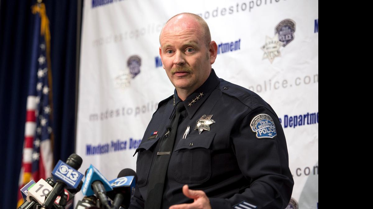 
Modesto Police Chief Galen Carroll speaks to the media about the homicides on Nob Hill Court during a press conference at Modesto Police headquarters in Modesto, Calif., on Monday, July, 20, 2015.
