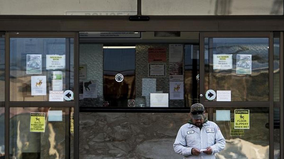 A sign seen on the exterior of Atwater City Hall in December 2015 reads “In God We Trust.”