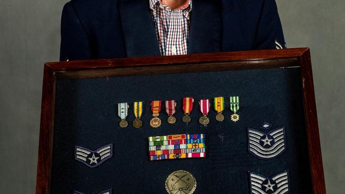 Atwater resident and U.S. Air Force veteran Billy J. Hannah, 75, holds a case of his medals. Hannah served in the Vietnam War.