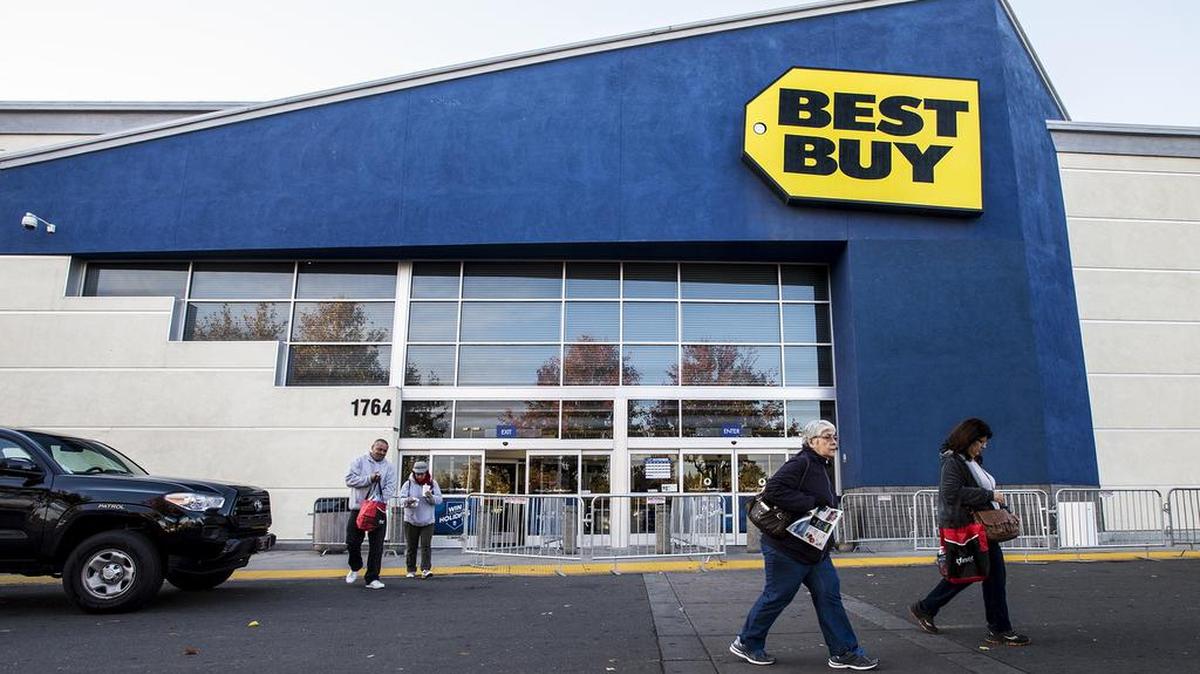 Black Friday shoppers exit Best Buy located at 1764 West Olive Avenue in Merced, Calif., Friday, Nov. 27, 2015. The store opened at 8 a.m..