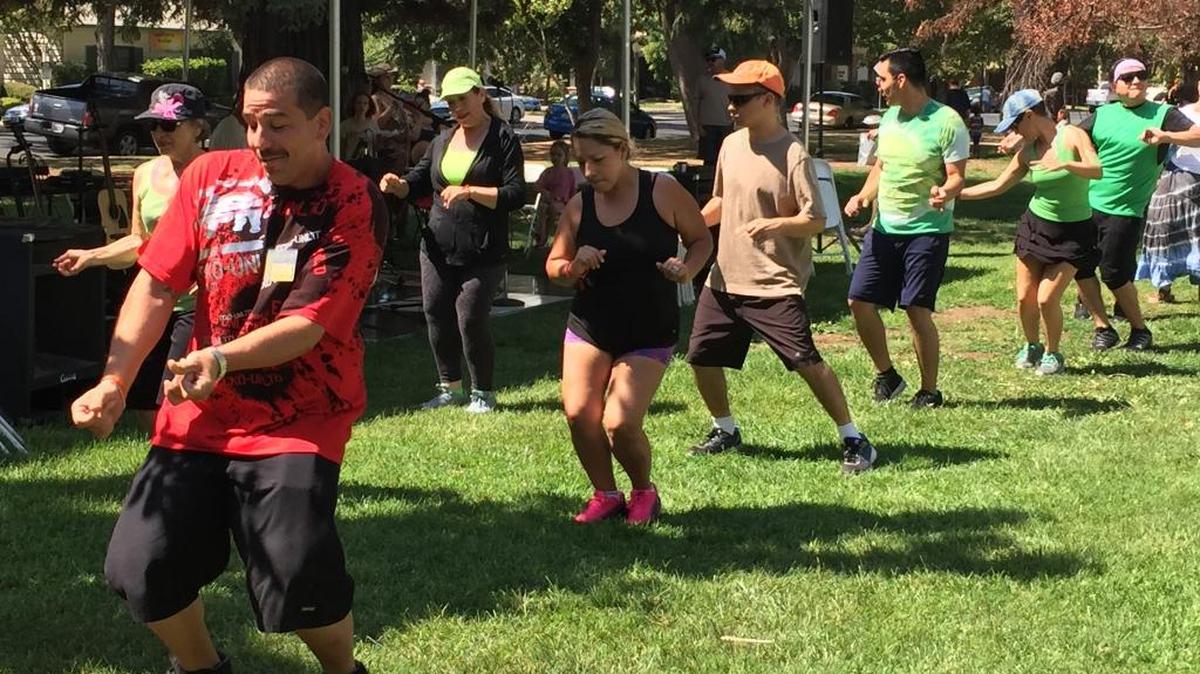 Community members dance during the second annual Sober Fest on Saturday, Sept. 10, 2016, in Merced County Courthouse Park.