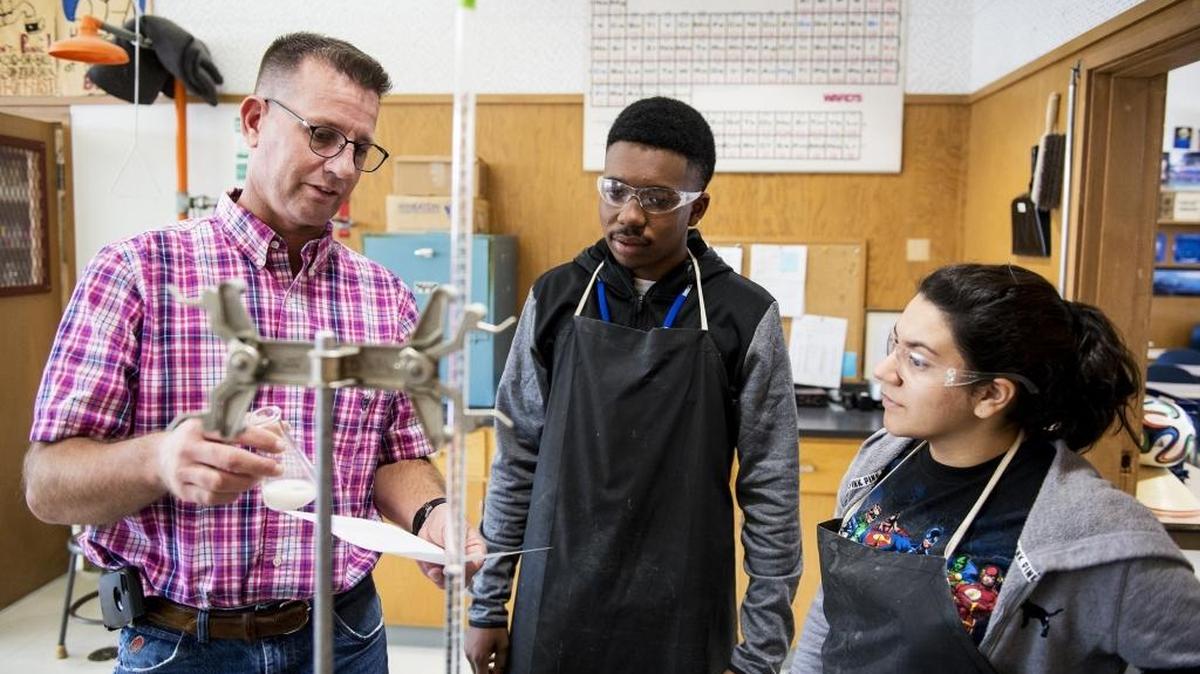Atwater High School Future Farmers of America Department chairman Dave Gossman, left, speaks with seniors and FFA members Daryl Dorsey and Christina Aguilar after students tested a sample of milk to test for bacterial growth and possible contamination at Atwater High School on Wednesday, Oct. 12, 2016. Nine FFA members will be competing in the California National FFA CDE Finals in Indianapolis, Ind., on Oct. 19-22.