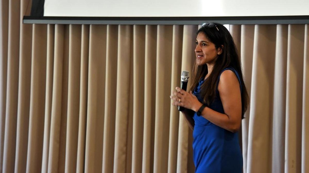 Annie Delgado, coordinator for the Lift While You Lead Summer Empowerment Program, welcomes families to a completion ceremony at UC Merced on Thursday, July 7, 2016. The program taught Merced middle school girls lessons on body image, bullying, building healthy relationships and leadership.