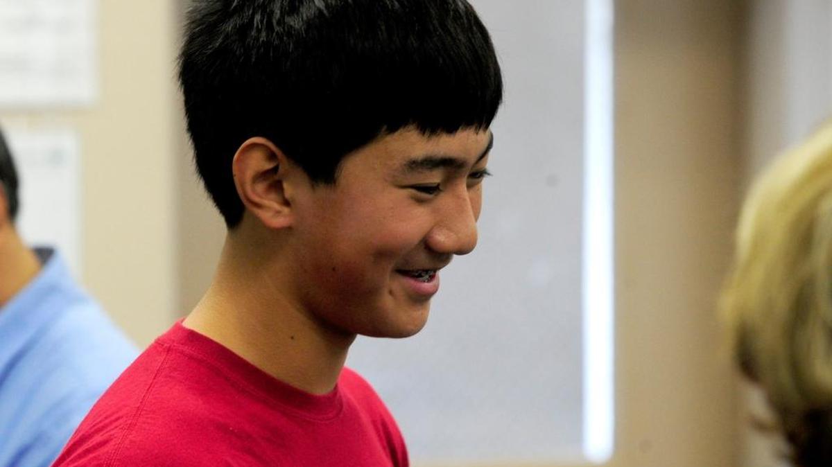 David Chen of Cruikshank Middle School smiles after winning first place for his grade level at the 2015-16 Merced County Spelling Bees.