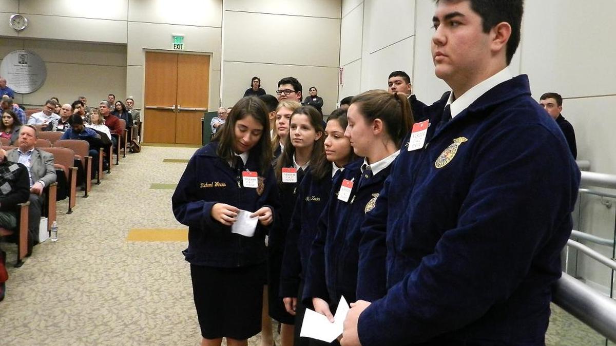 Ethan Jones, right, and other FFA members from Hilmar High School wait to speak Tuesday before the State Water Resources Control Board in Sacramento against the proposed flow increases for the Stanislaus, Tuolumne and Merced rivers.