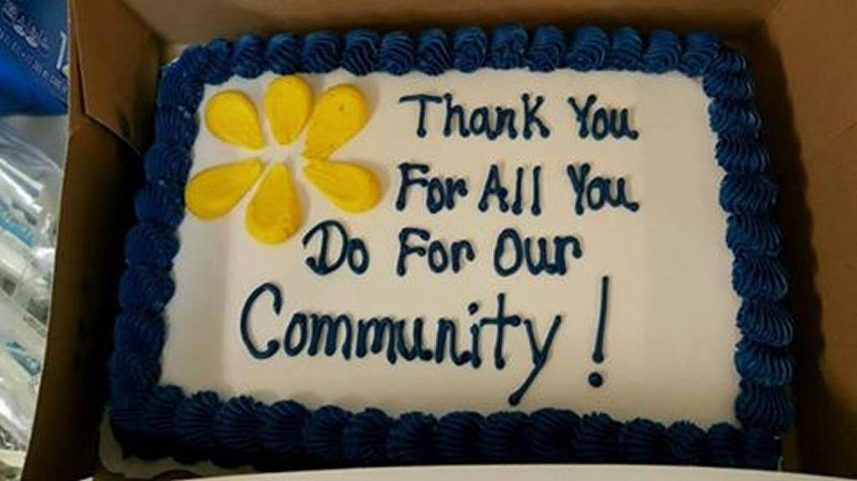 The Atwater Wal-Mart management team delivered a cake Thursday, July 21, 2016, to show support and appreciation for local law enforcement after police killings in Dallas and Baton Rouge, La., this month.