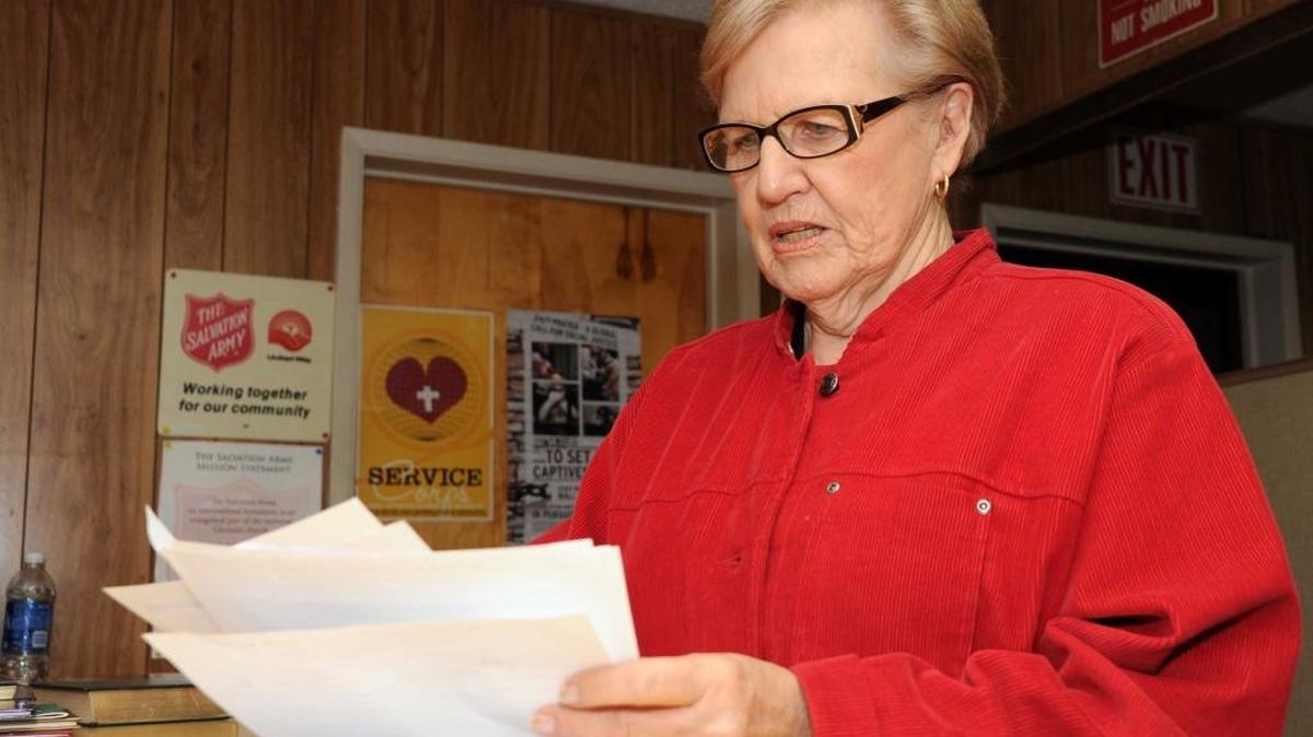 Salvation Army board member Elaine Gale, coordinator of A Helping Hand at Christmas campaign, sorts through applications from those seeking assistance in 2012. The annual campaign, now in its 30th year, is a joint effort by The Salvation Army and the Merced Sun-Star to raise money that goes to help local families and residents in need.