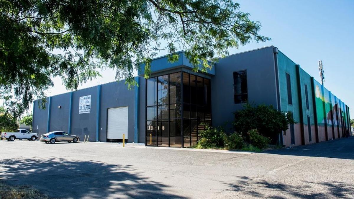 The Merced County Food Bank on Olive Avenue in Merced, seen in July, has extended its hours and is now open Saturdays to give out food boxes from the Drought Food Assistance Program.
