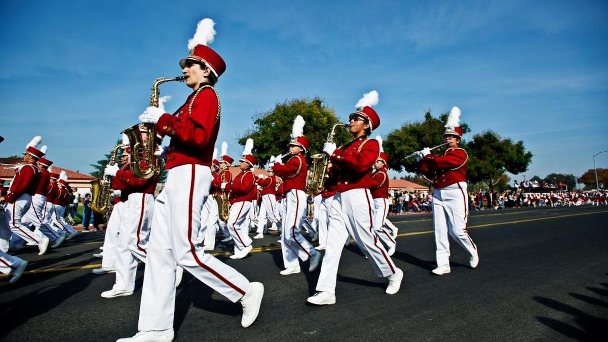 The Golden Valley High School marching band performs on East Childs Avenue during the 2014 Central California Band Review at Golden Valley High School in Merced.