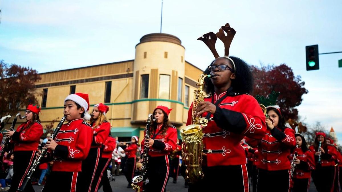 The Weaver Middle School marching band performs during the 2014 Merced Hometown Christmas Parade.
