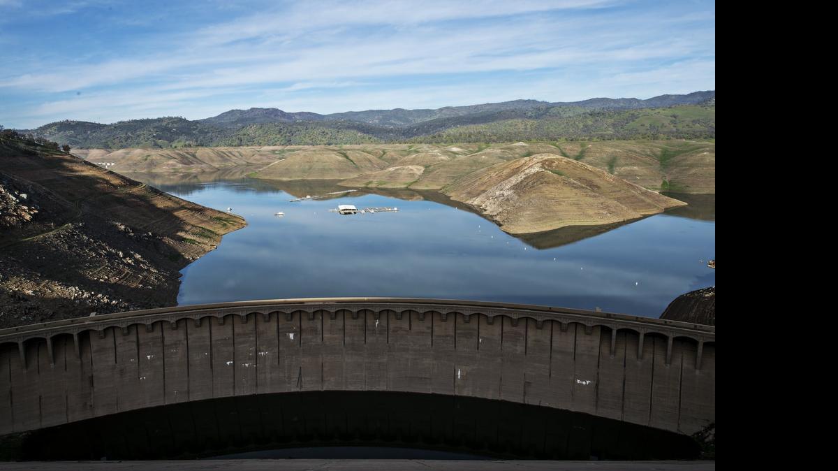 
A view of Lake McClure from the New Exchequer Dam in Snelling on Feb. 11. Residents are being asked to comment on proposals that could restrict water deliveries to farmers for the next 50 years.

