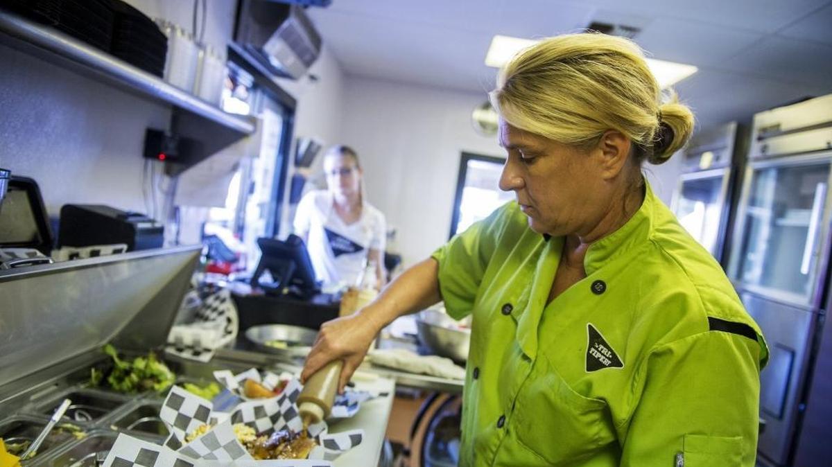 Chef Dana Longinotti, 53, of Ceres, prepares an order at the Tri-Tipery, an eatery located at 11359 Newport Rd. in Ballico, Calif., on Tuesday, Sept. 26, 2017.