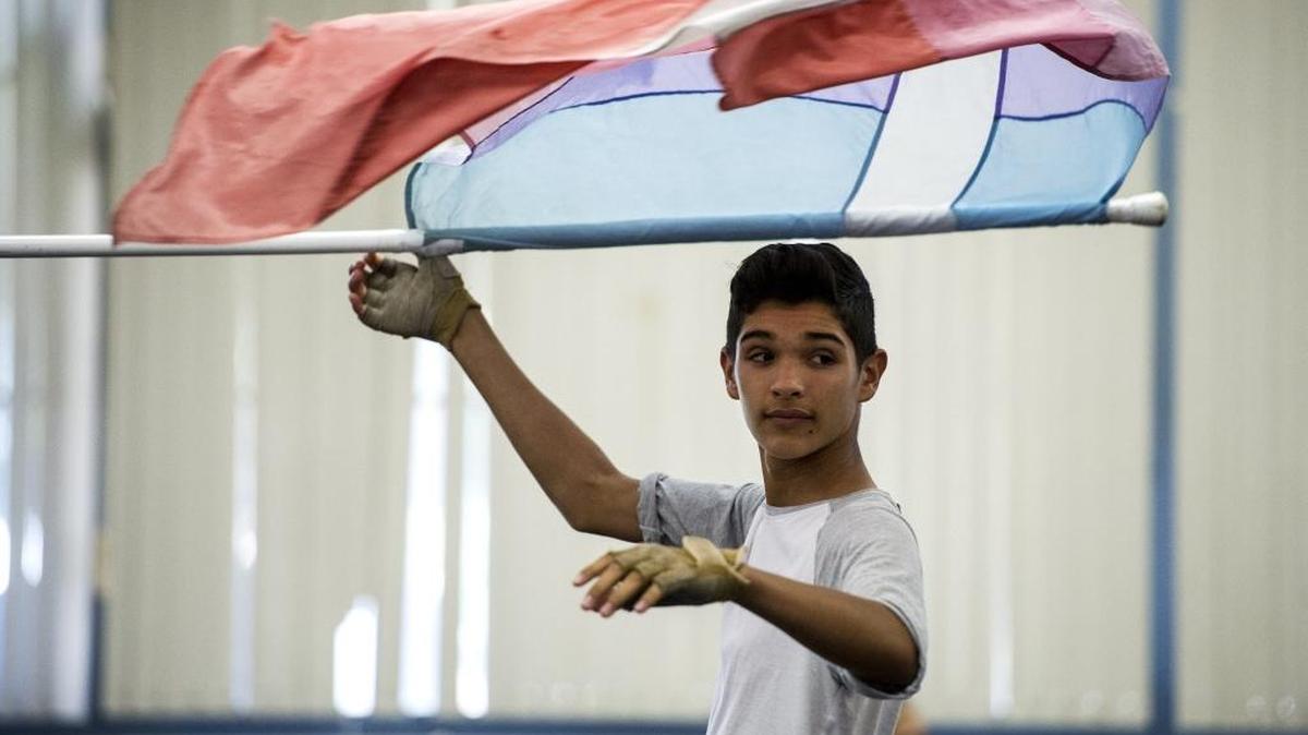 Merced High sophomore Mateo Alfaro, 15, practices Thursday, March 31, 2016, with the school’s winter guard. The group placed fourth at the Western Championship in Las Vegas.