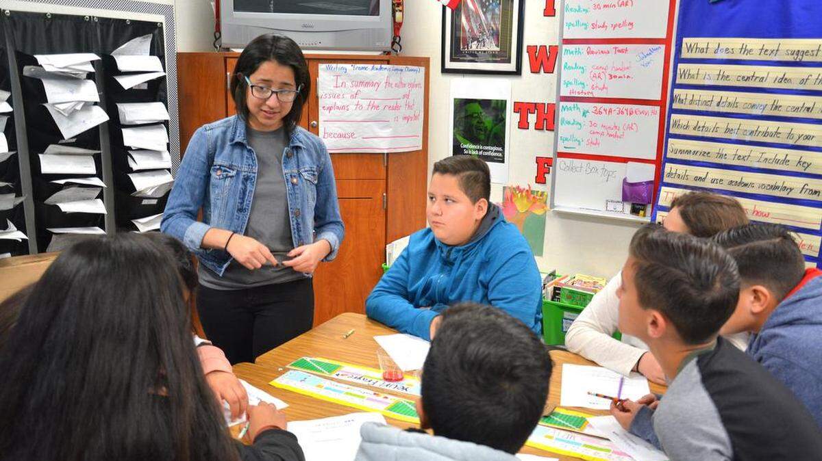 UC Merced chemistry student Jessica Lopez answers questions from sixth graders during a STEM field demonstration Friday, Feb. 24, 2017, at Lorena Falasco Elementary School.