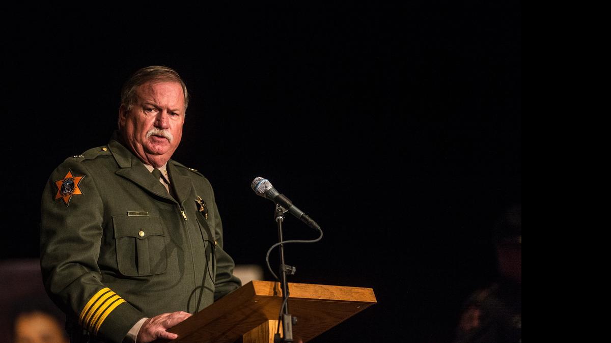 
Merced County Sheriff Vern Warnke speaks to friends and family of fallen officers during the 10th Annual Merced County Peace Officers Memorial Ceremony at the Art Kamangar Center Merced Theatre in Merced on Wednesday.
