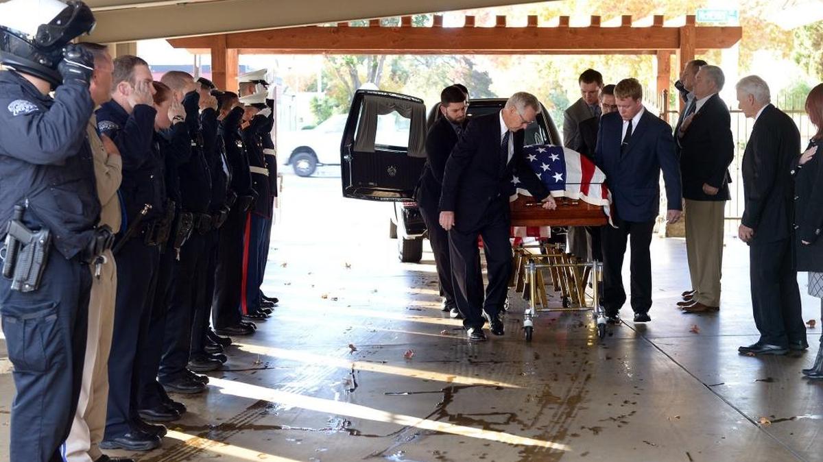 Marine Cpl. Layne Johnson’s casket is brought Tuesday afternoon, Nov. 24, 2015, to Franklin & Downs Funeral Home in Modesto. Johnson was killed in a one-vehicle accident last Wednesday on Highway 99 in Tulare County.