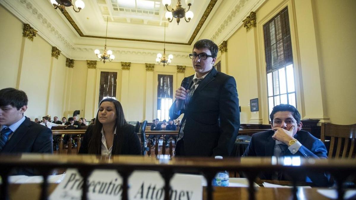 Pacheco High School student Jeremy Frost, center, questions a witness while acting as a prosecuting attorney during a mock trial at the Merced County Courthouse Museum in Merced, Calif., on Wednesday, Jan. 11, 2017. The Merced County Office of Education and the Merced County District Attorney’s Office hosted the county’s first mock trial at the historic building.