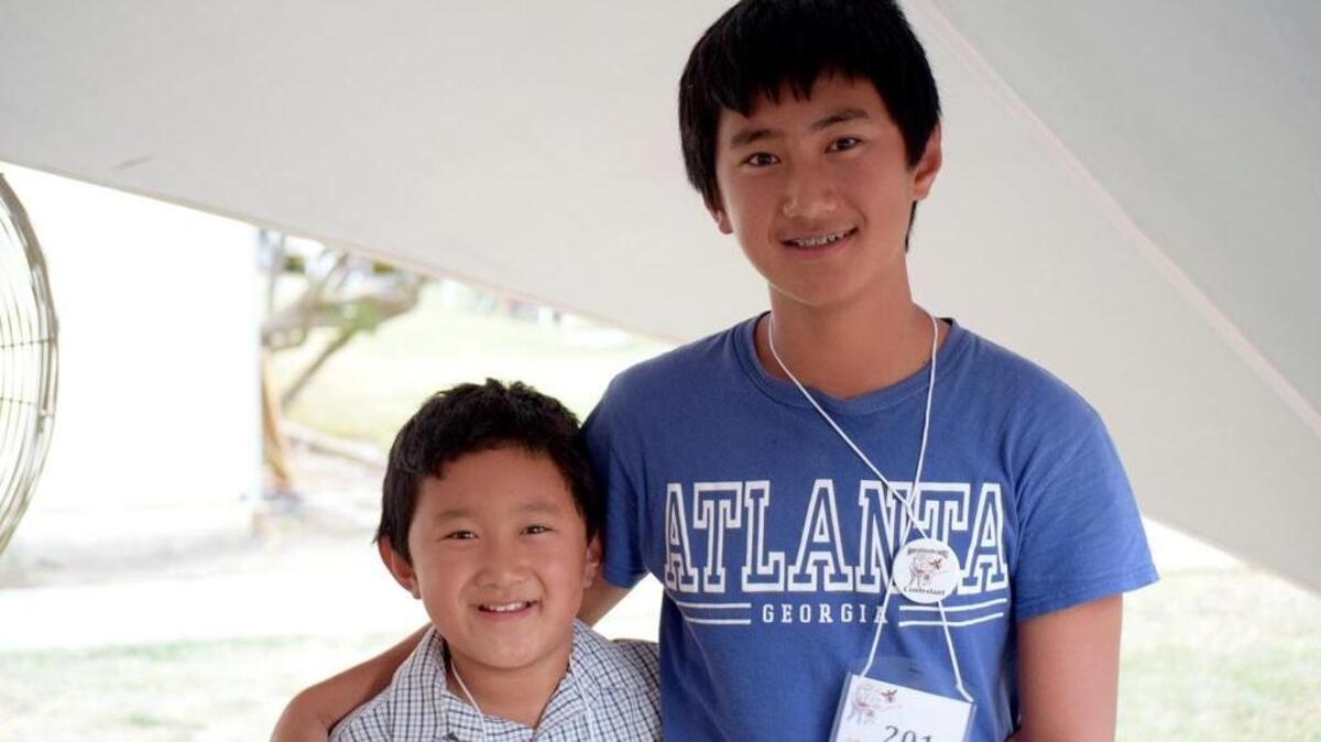 Brothers Daniel, left, and David Chen each placed first in their grade levels at the Merced County Office of Education Spelling Bee.
