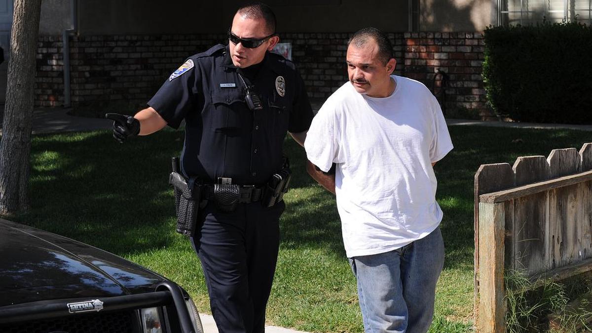 Alvaro Negrete, 39, is arrested by Los Banos Police Thursday, July 28, at a home on Smokey Drive.