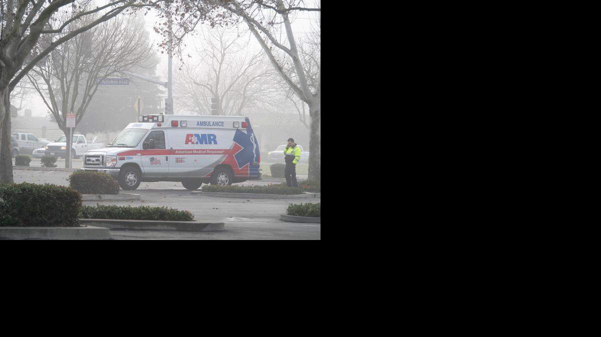 
An AMR ambulance at a Turlock shopping center parking lot near the Save Mart Supermarket on Geer Road awaits calls Tuesday morning. The thick fog can delay emergency responders of all types, as they can’t see through it better than anyone else.
