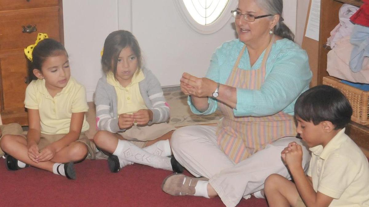 
Green Valley Charter School kindergarten teacher Julia Capocelli leads story time last month .
