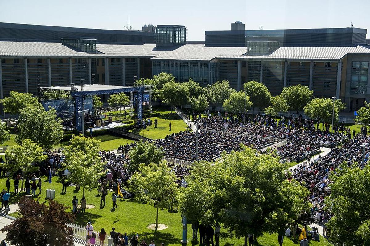 A view from the Kolligian Library as a commencement ceremony is held for the University of California, Merced School of Engineering and School of Natural Sciences, in the Carol Tomlinson-Keasey Quad on the UC Merced campus in Merced, Calif., on Saturday, May 13, 2017.
