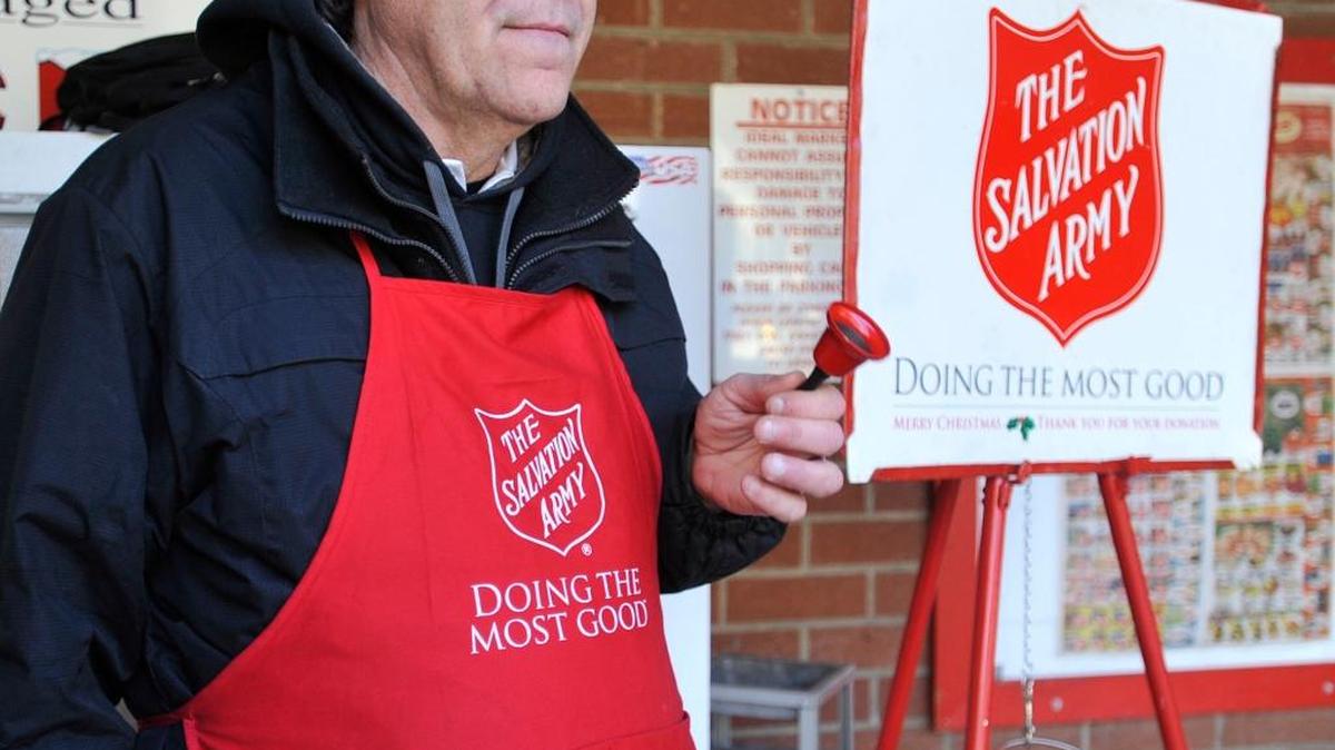 FILE - Salvation Army bell ringer Domonic Gates rings the bell outside of the Ideal Market in Johnstown, Pa. on Dec. 8, 2016. A free after-school program offered by the Merced Salvation Army, focused on the educational and overall well-being of elementary school students, might not continue into the next school year without funding. (Todd Berkey /The Tribune-Democrat via AP, File)