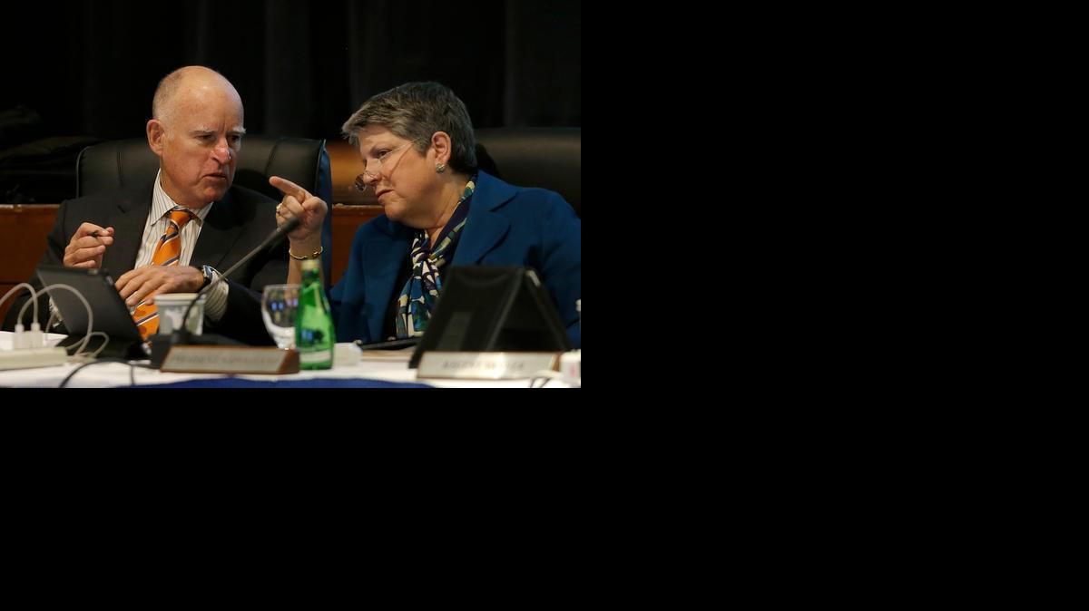 Gov. Jerry Brown, left, and UC President Janet Napolitano talk during a UC Board of Regents meeting Wednesday in San Francisco.