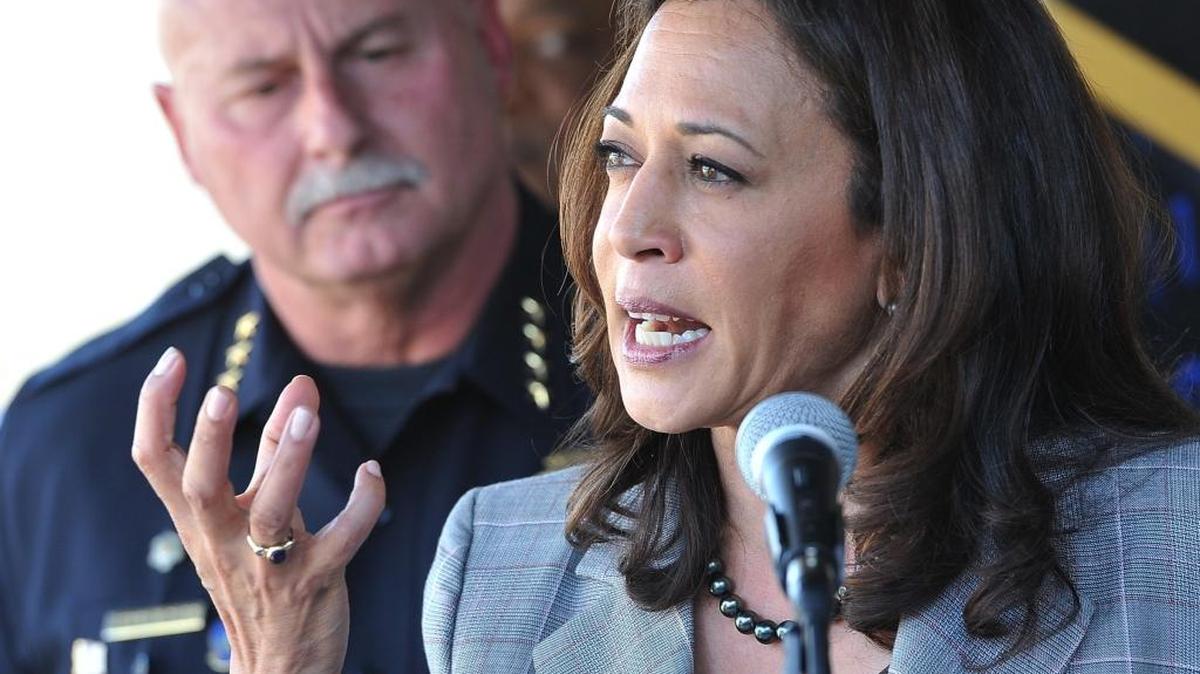 State Attorney General Kamala Harris, who will replace Barbara Boxer next month in the U.S. Senate, talks of the crackdown on cyber crimes during an October news conference at Fresno State. Fresno police Chief Jerry Dyer is behind Harris.