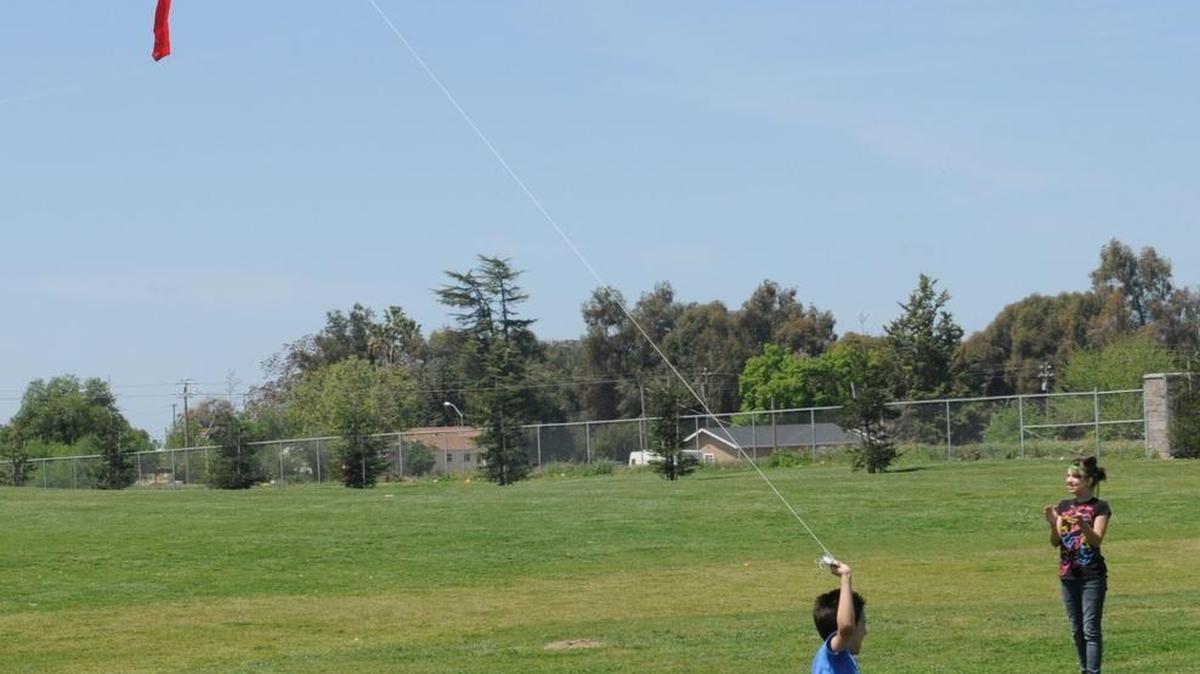CHRISTOPHER WINTERFELDT/cwinterfeldt@mercedsun-star.com Matthew Villegas, 9, flies a snake themed kite during the “Time to Fly” Livingston Kite Festival on April 15, 2012. This years kite festival will be on Sunday, April 9 at Livingston Middle School from 8 a.m. to 4.