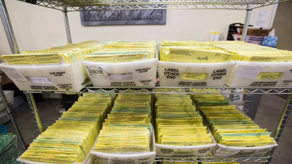 Ballots submitted by mail or drop-box wait to be counted at the Merced County Elections Warehouse in Merced, Calif., Thursday, Nov. 10, 2016.