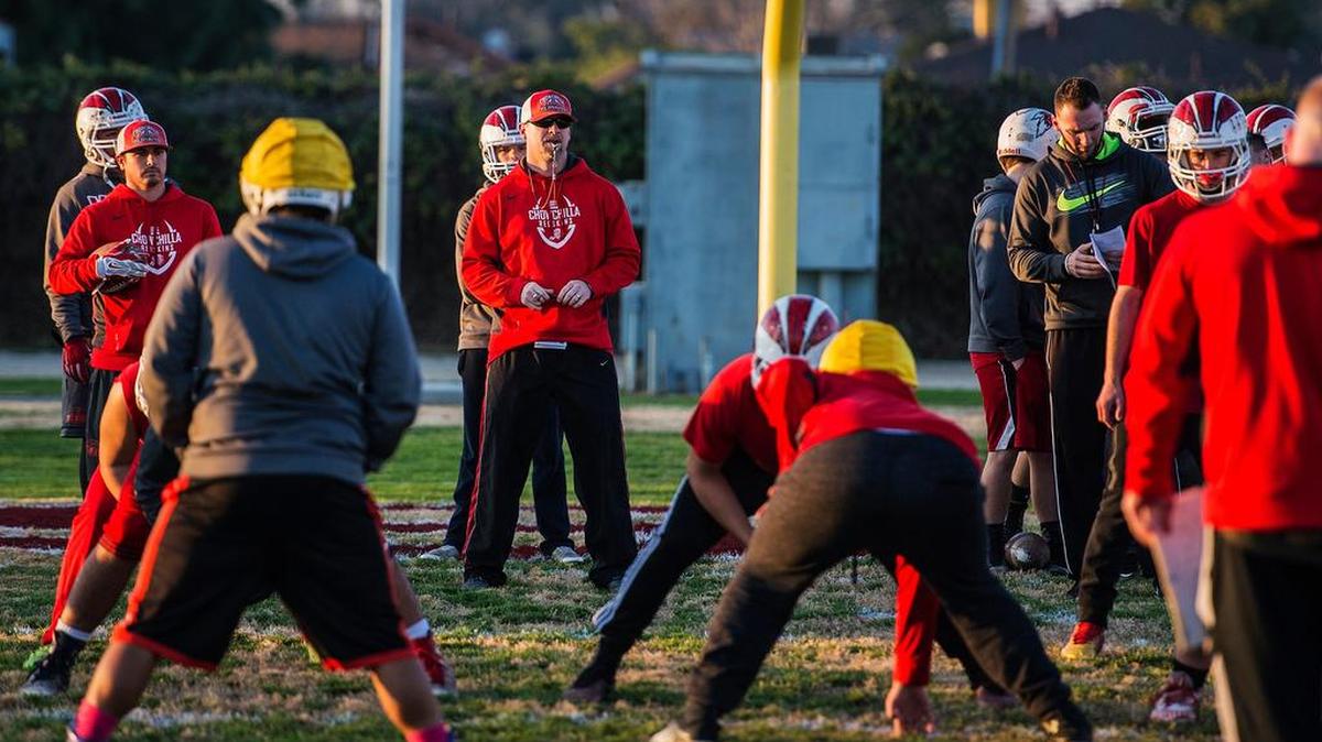 Head coach Alex Pittz looks on during football practice Friday at Chowchilla High School.