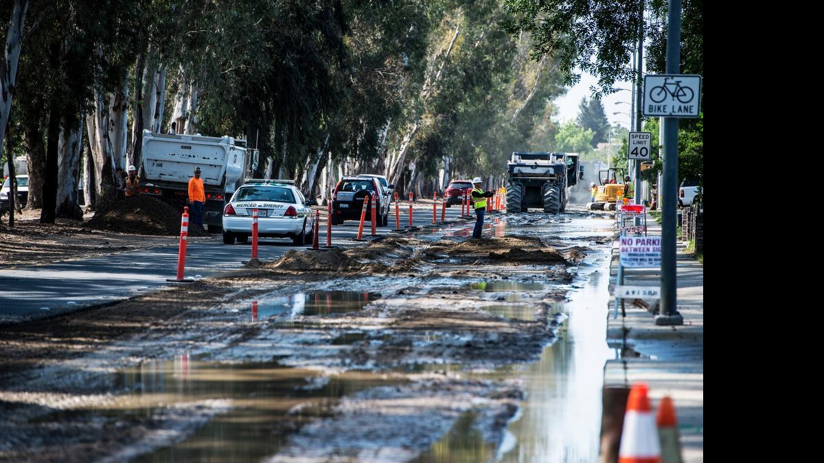 
Water floods a construction site along the southbound lanes of M Street between West Yosemite Avenue and West Donna Drive in Merced on Wednesday.
