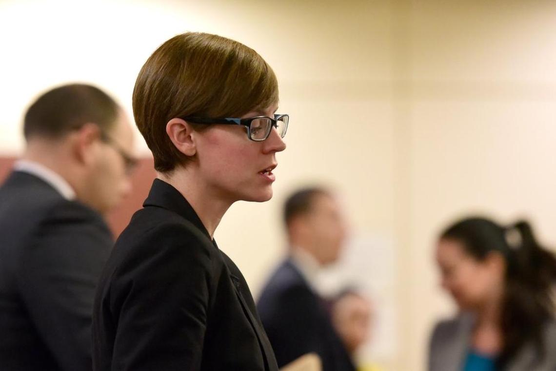 Former Deputy District Attorney Ilia McKinney speaks in court while looking at her laptop on Thursday, July 13, 2017 in Merced.