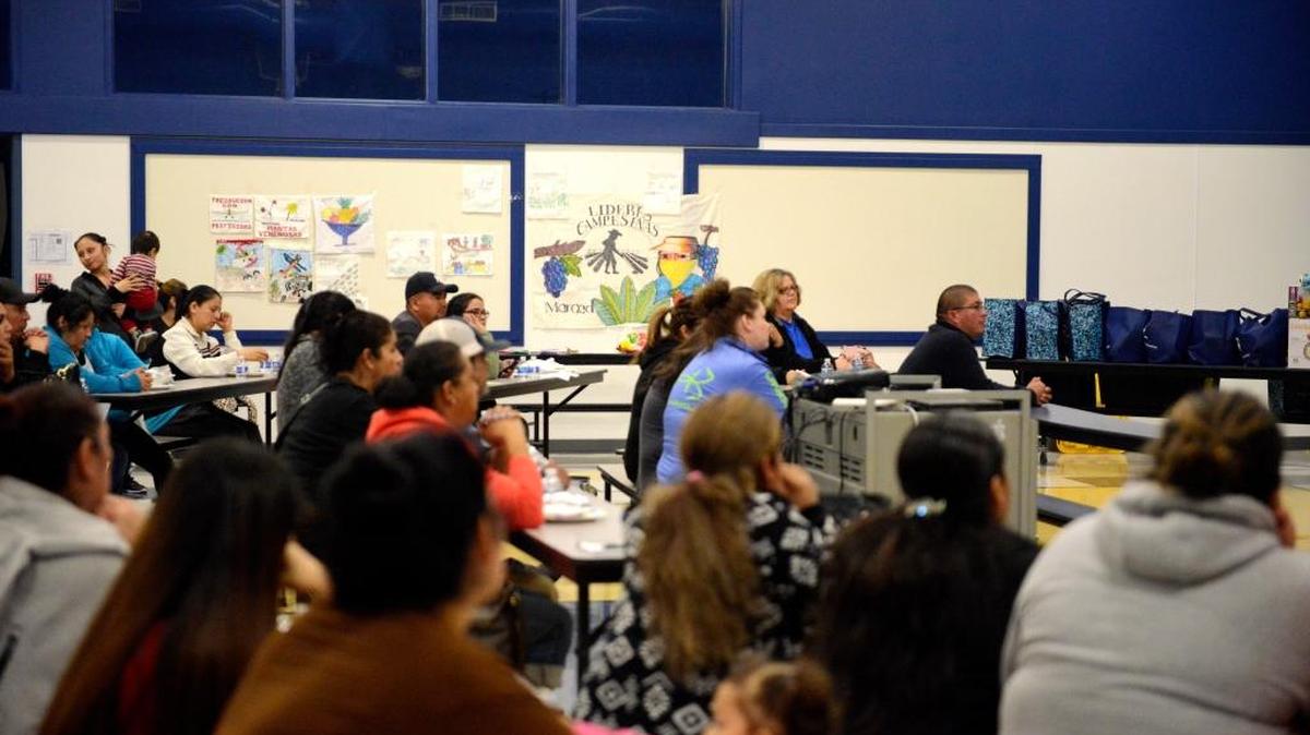 Parents and community members in Planada attend a "Know Your Rights" immigration forum at Planada Elementary School on Tuesday, Jan. 31, 2016.