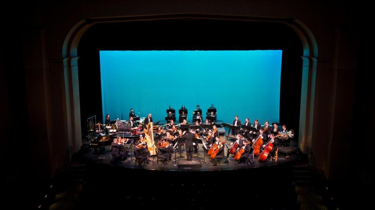 The Merced Symphony, conducted by Ming Luke, performs during a concert at Merced Theatre last year.
