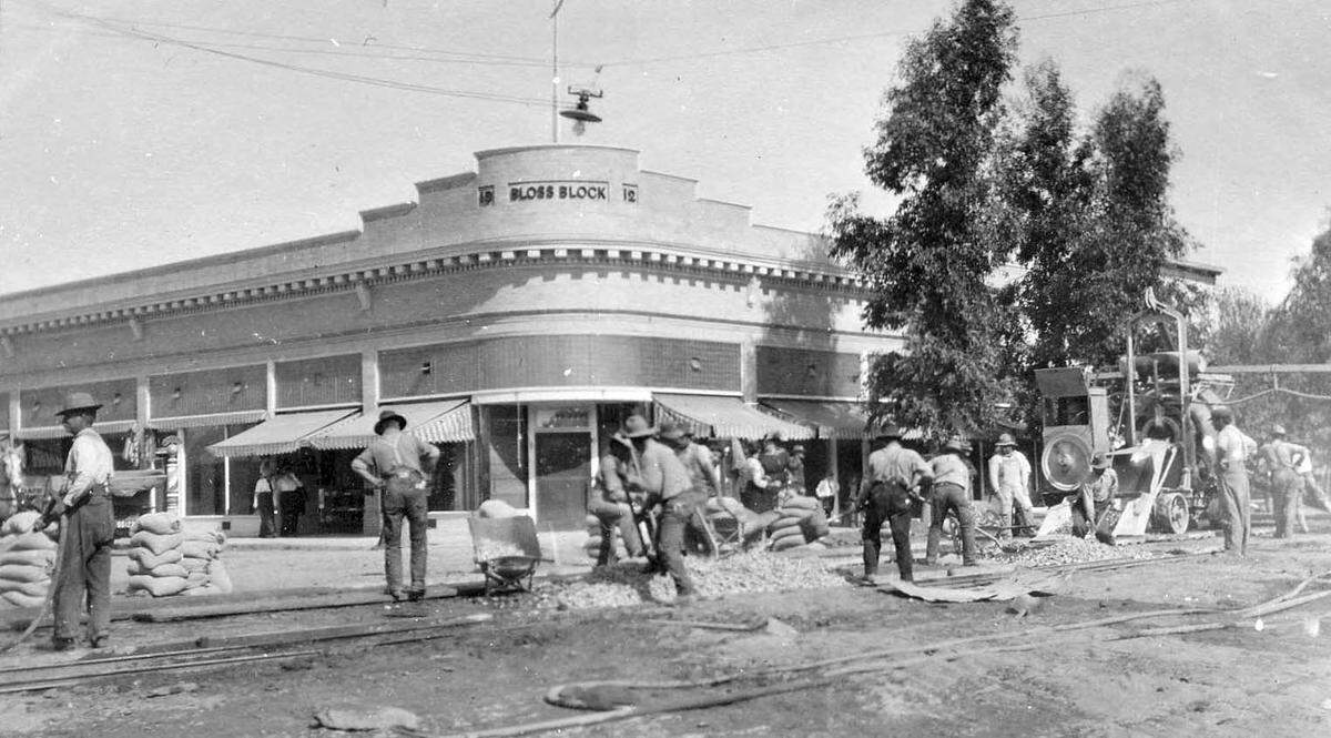 Paving Atwater Boulevard, circa 1918-20. Atwater Blvd. (Front Street) was the first street paved in Atwater. Pictured here is the corner of Atwater Blvd. and 3rd Street. Bloss Block, built in 1912, is in the background. Atwater was incorporated on August 16, 1922.