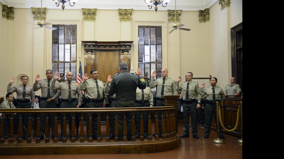 
Merced County Sheriff Vern Warnke administers the swearing-in of new hires for the Merced County Sheriff’s Department on Monday at the Merced County Courthouse Museum.
